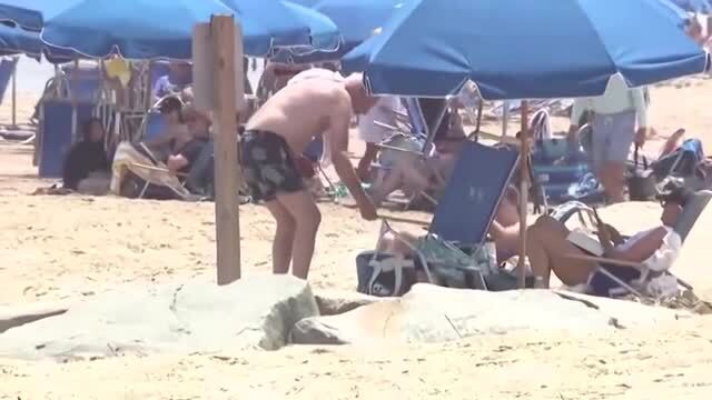 A Shirtless Joe Biden Enjoys a Relaxing Day at the Beach