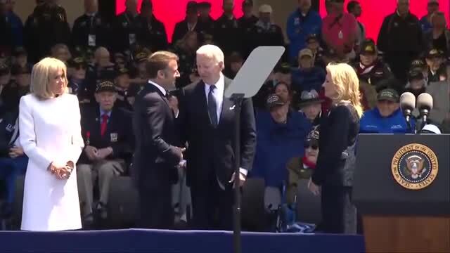Joe Biden Attempts to Sit Down on a Non-Existent Chair at the D-Day Commemorations